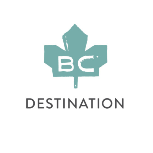 A teal maple leaf with the letters "BC" inside is above the word "DESTINATION" in capital letters, representing vacation rental management in Harrison Hot Springs, all set on a white background.