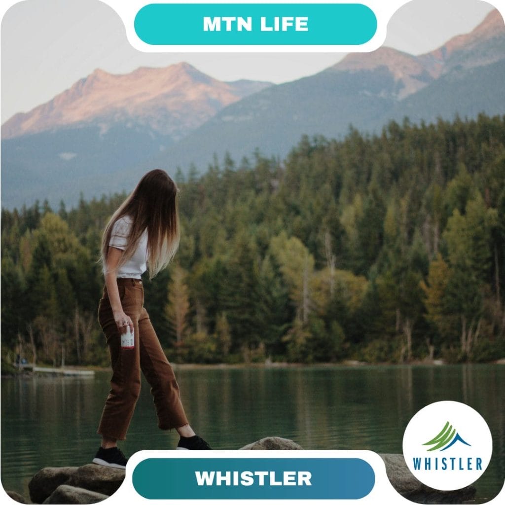 A woman stands on rocks by a calm lake with forest and mountains in the background; "MTN LIFE" and "WHISTLER" banners frame the image, inviting guests to explore one of the most breathtaking destinations.