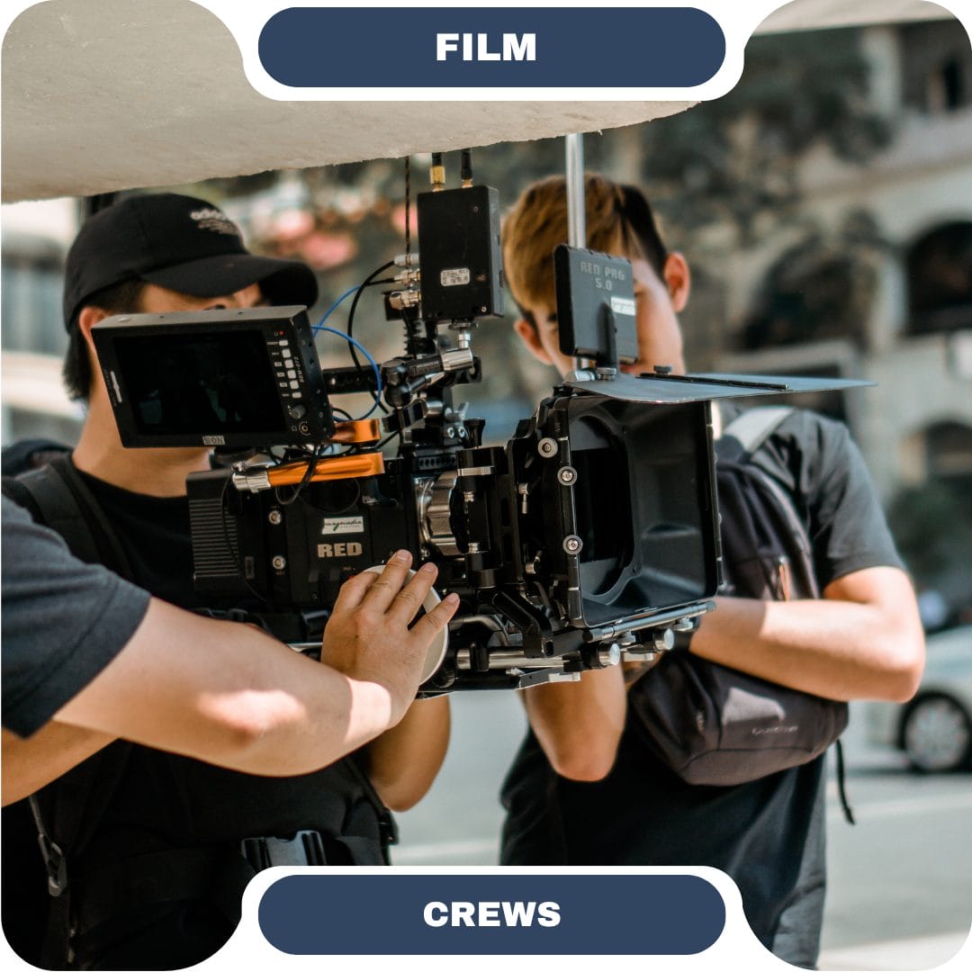 Two people operate a professional film camera outdoors, with film equipment visible; the words "FILM" and "CREWS" appear on the image, highlighting furnished rentals ideal for accommodating production teams.