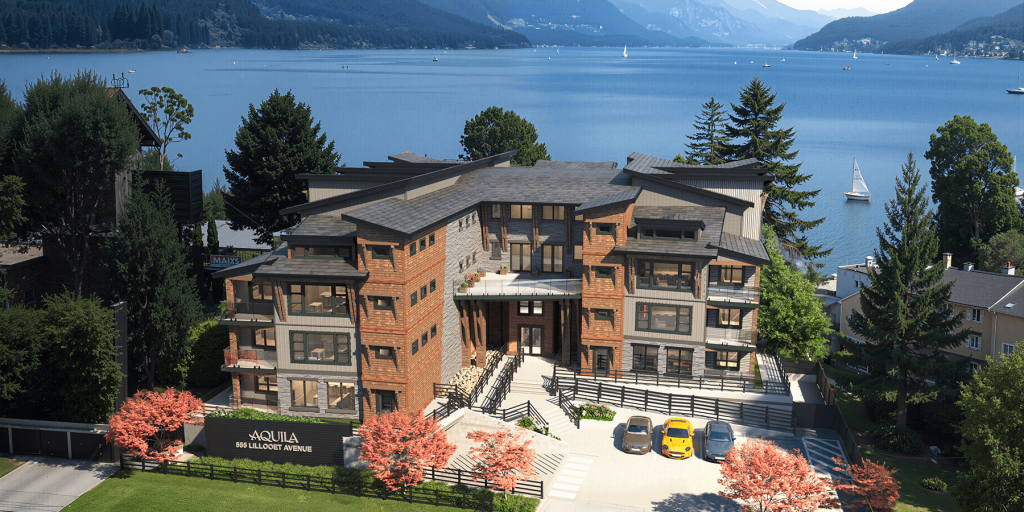 A modern multi-story residential building, Cultus Grove, with balconies overlooks a lake dotted with sailboats and framed by mountains. Three yellow cars are parked in front.